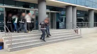 Bursa merkezli organize suç örgütüne şafak baskını: İş insanlarını tehditle zorla çek imzalattıkları iddiası